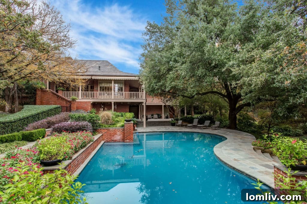 Beautifully manicured gardens and vibrant landscaping surrounding the luxury estate at 700 Sunrise Court