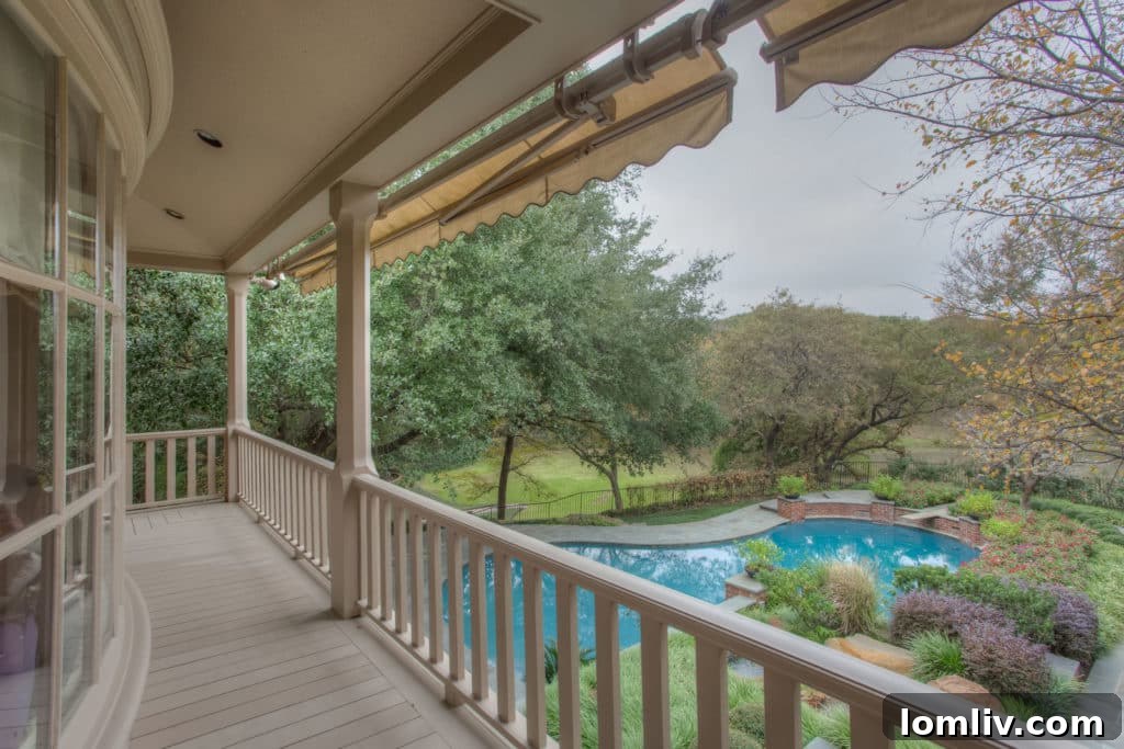 Relaxing on the expansive wrap-around balcony at 700 Sunrise Court, offering a resort-like experience amidst natural beauty