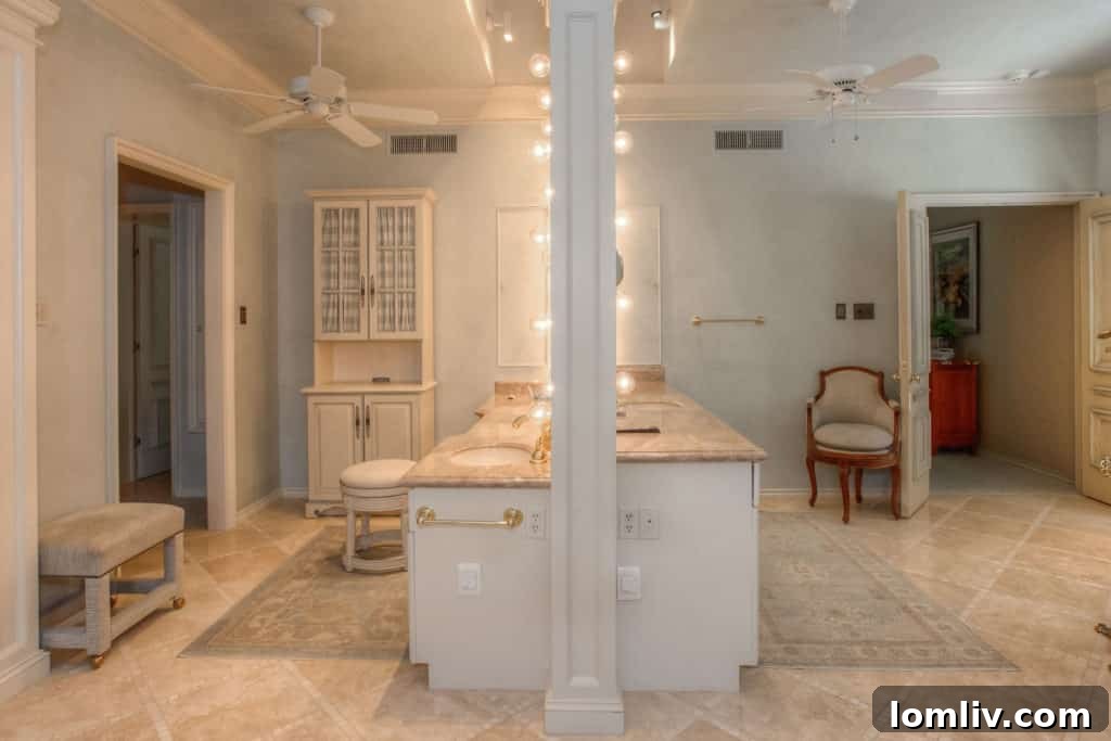 Luxurious master bathroom with dual amenities, part of the sprawling master suite at 700 Sunrise Court
