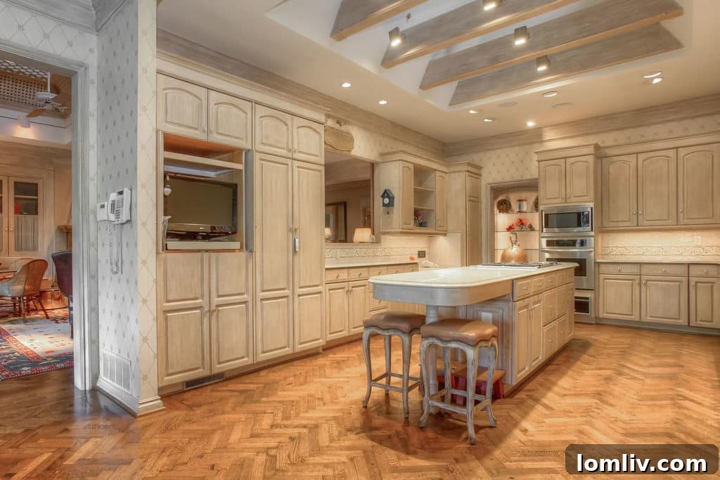 Close-up of intricate herringbone hardwood floors and custom detailing, showcasing rare attention to craftsmanship at 700 Sunrise Court