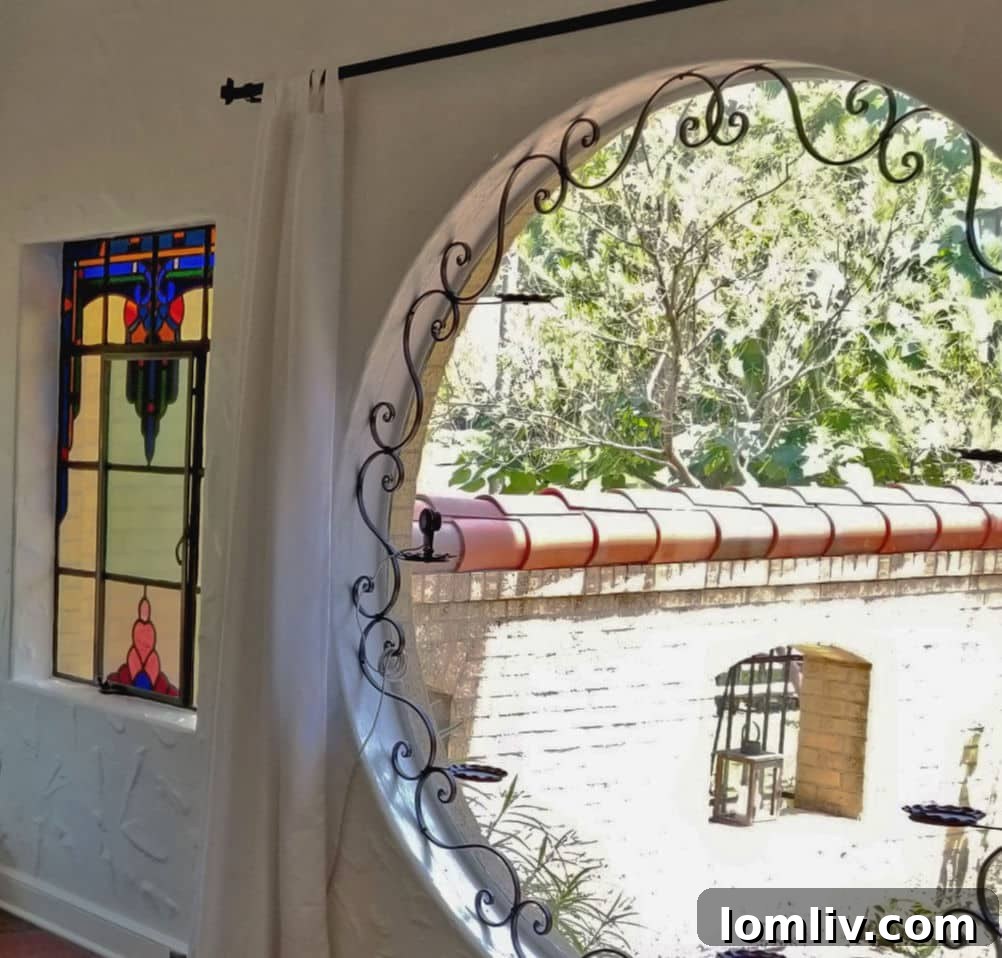 Innovative Round Window with Candle Ironwork in Hutsell Sunroom