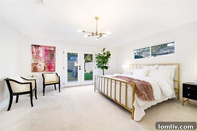 Spacious Master Bedroom with French Doors to Backyard Oasis