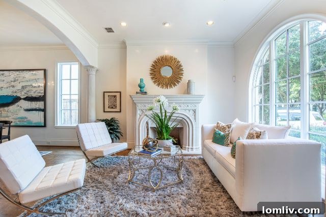 Luxurious Grand Room with Fireplace and Seating at 4311 Livingston