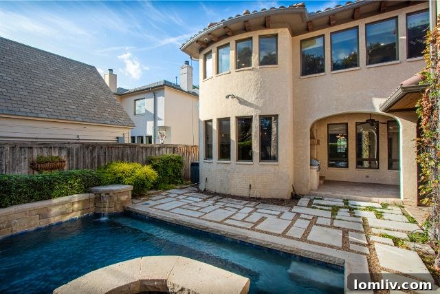 Lush Landscaping Surrounding the Pool Area at 4311 Livingston