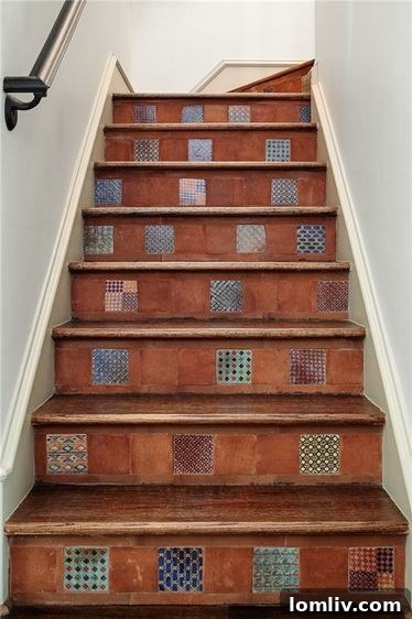 Custom Handpicked Tile Staircase in Luxury Home Renovation