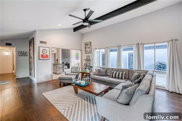 Spacious Living Room with High Ceilings and Modern Fireplace