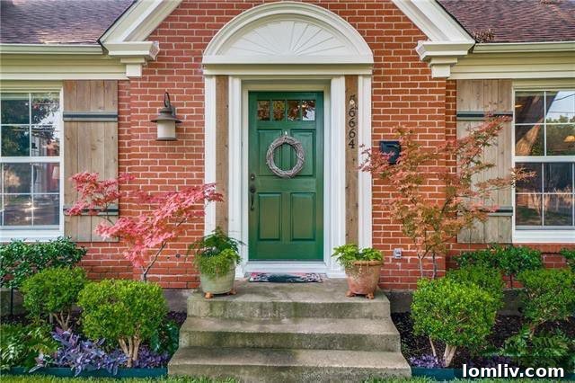 Classic brick exterior of 6664 Santa Anita Drive, a charming home listed by Wayne Garcia with Dave Perry-Miller InTown.