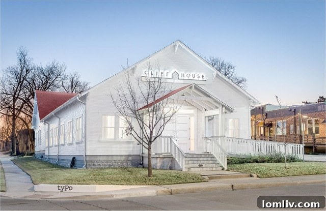 AIA Dallas Celebrates Local Architectural Excellence 5 Detailed exterior view of Cliff House showcasing new windows, porch, and accessible ramp after renovation.