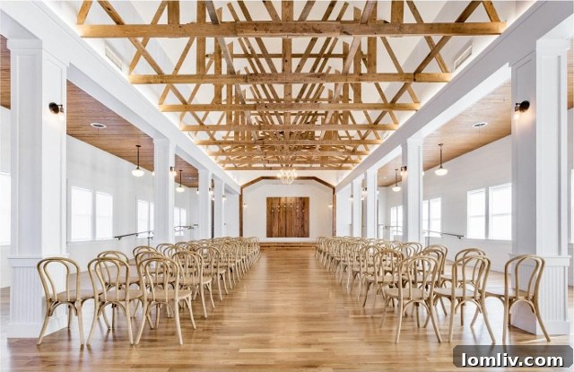 AIA Dallas Celebrates Local Architectural Excellence 7 The transformed interior of Cliff House, showcasing its bright, airy space with exposed trusses and colonnade.