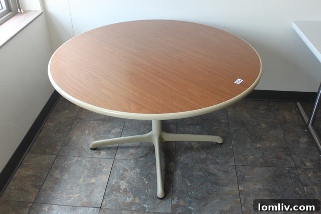 Formica topped wooden grain round table