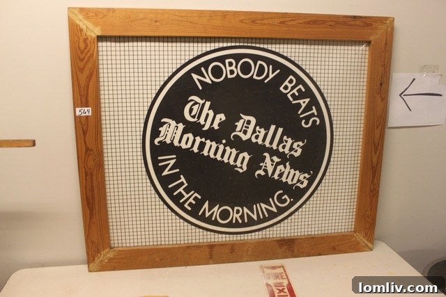 Framed art reading 'Nobody Beats The Dallas Morning News in the Morning'