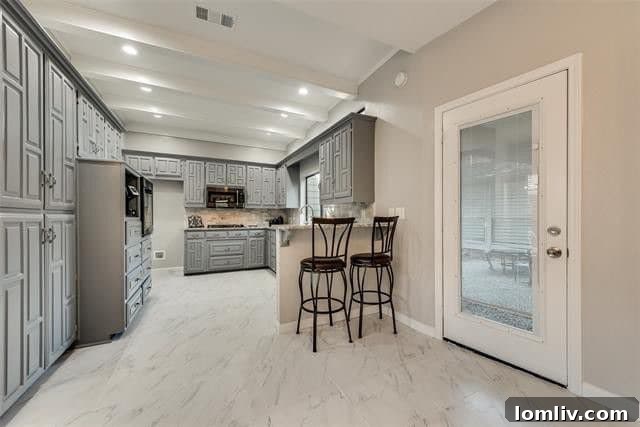 Refreshed kitchen with original cabinets and updated hardware