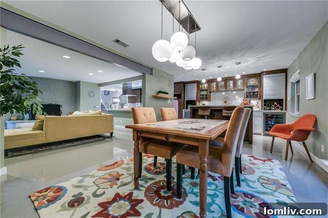 Open concept living area with low-maintenance tile floors at 10427 Coleridge Street