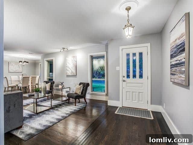 Exterior view of 833 Sylvania Drive, a renovated midcentury ranch home with a spacious front yard