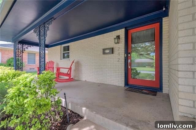 Colorful front door and brick exterior of a Dallas home