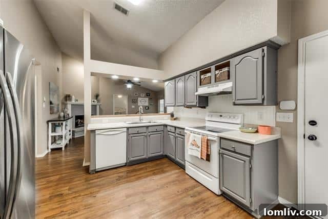 Well-Maintained Kitchen with Ample Cabinet Space and Modern Appliances