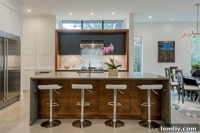 Marc Marion's Midcentury Masterpiece: A Green-Certified Builder's Home 6 Waterfall Island Walnut Cabinets