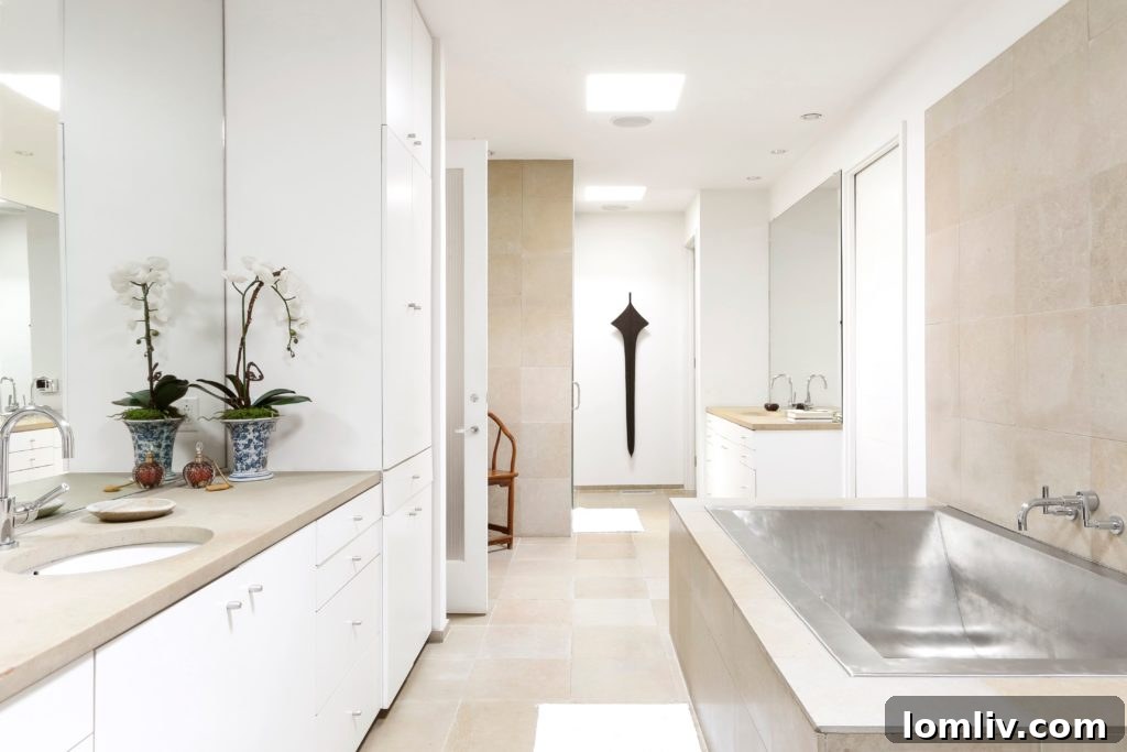 Elegant master bedroom overlooking lush greenery