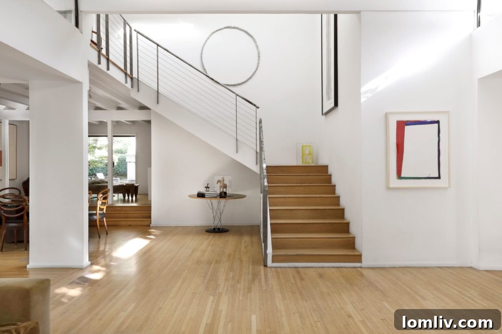 Modern kitchen with waterfall granite and stainless steel appliances