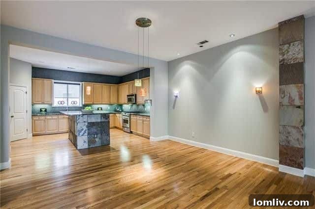 Luxurious master bedroom with ample natural light in an Uptown condo