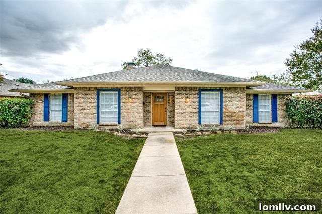 Exterior view of 410 Birch Lane with blue shutters in Richland Park, Richardson