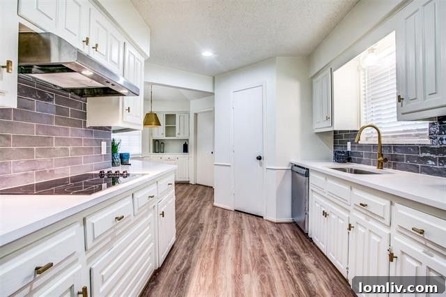 Modernized bathroom with designer tile and quartz sink in a Richardson renovation