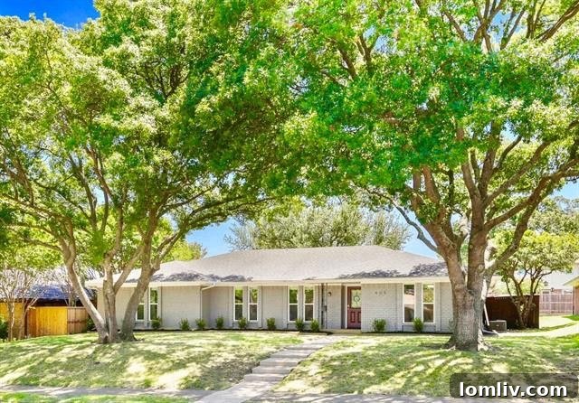 Front exterior of a renovated Richardson home on a large lot