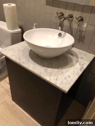 Salvaged bathroom vanity and faucet, a prime example of high-quality items available at DFW Pre-Demolition sales.