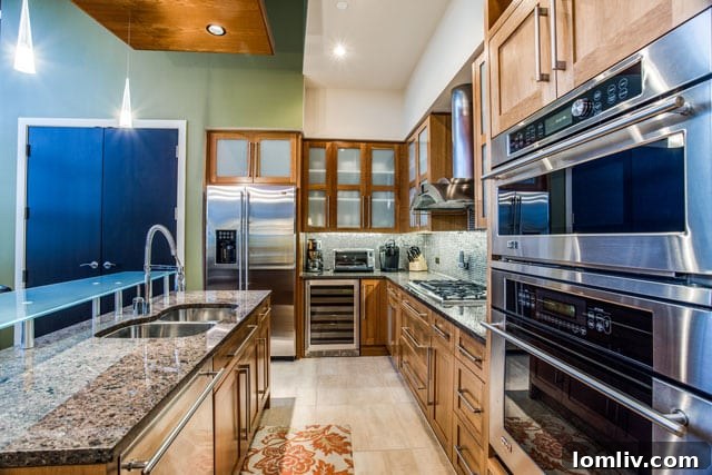 Compact yet fully equipped kitchen at 2600 W. 7th #1801, featuring a wine fridge, convection microwave, oven, and gas cooktop for premium functionality.