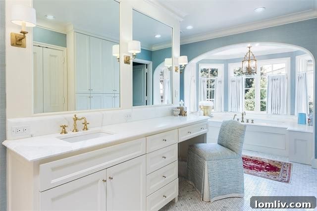 Hal Thomson Tudor Masterpiece: A Landmark Listing 9 4209 Bordeaux - Elegant Master Bathroom with Modern Fixtures