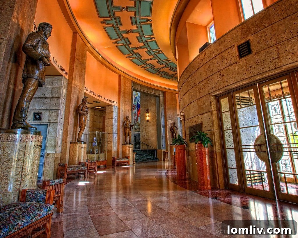The Dallas Historical Society: Safeguarding the Hall of State's Legacy 6 An aerial view or high-angle shot of the Hall of State in Dallas Fair Park, showcasing its architectural layout