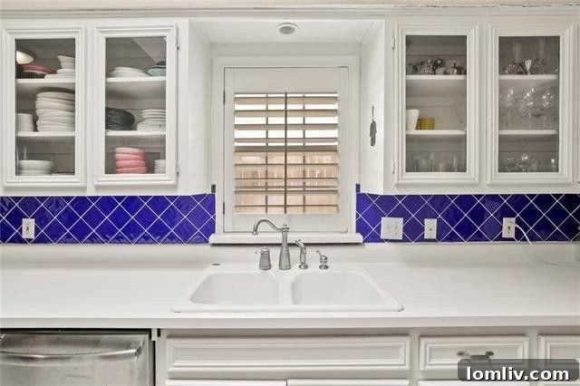 Tasteful Traditional kitchen with glass cabinets