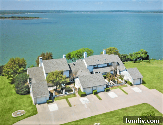 Breathtaking aerial view of one of White Bluff Resort's championship golf courses, with manicured greens, sand traps, and the expansive Lake Whitney in the background
