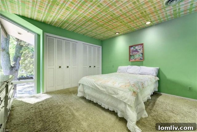 Bedroom with Distinctive 1970s Wallpaper Application and Bold Design