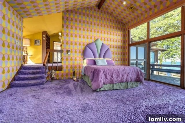 Master Bedroom with Highly Patterned 1970s Wallpaper and Lake Views