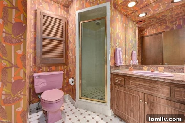 1970s Bathroom Interior with Multiple Patterned Tiles and Wallpaper
