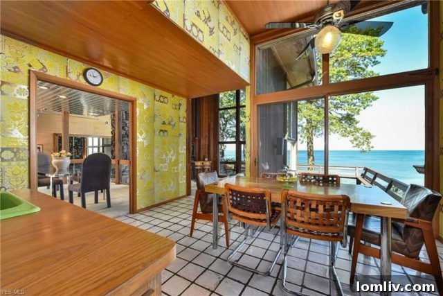 Retro Kitchen Interior with Distinctive Yellow Wallpaper and Vintage Appliances