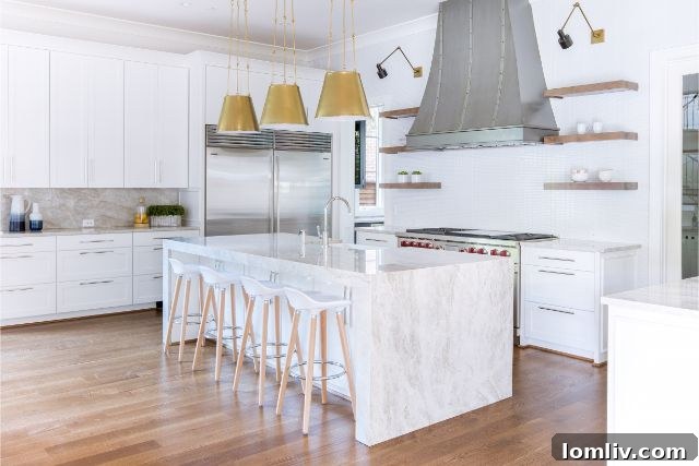 Gourmet kitchen by Alford Homes, featuring transitional finishes, island, designer cabinetry, and commercial-grade appliances in University Park.