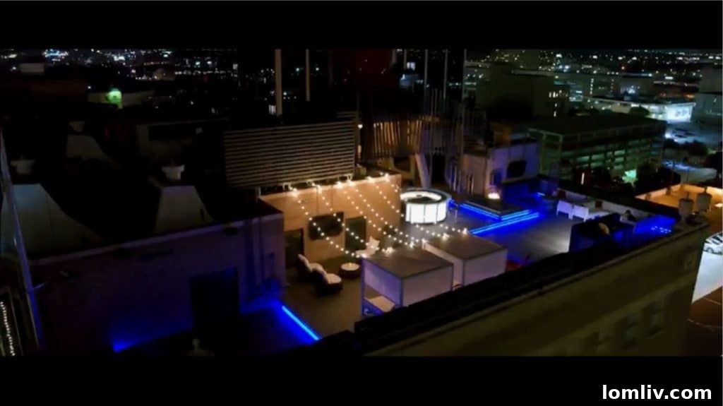 Rooftop deck perimeter lighting system on Fort Worth penthouse, offering dynamic color changes for customizable mood ambiance.
