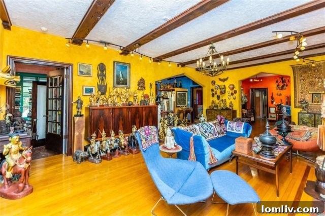 Living room filled with an array of unique sculptures and art pieces, creating a striking visual.