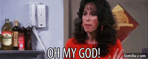 Kitchen area featuring an unusual collection of masks, blending functionality with artistic display.