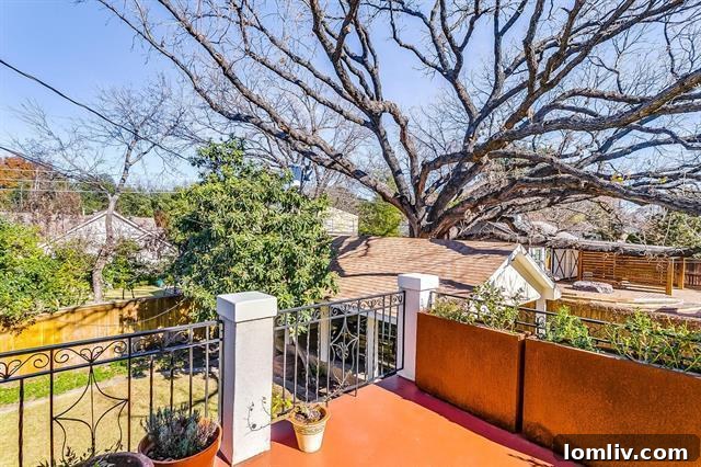 Thoughtfully updated master bathroom featuring Spanish-style floor tile and modern fixtures