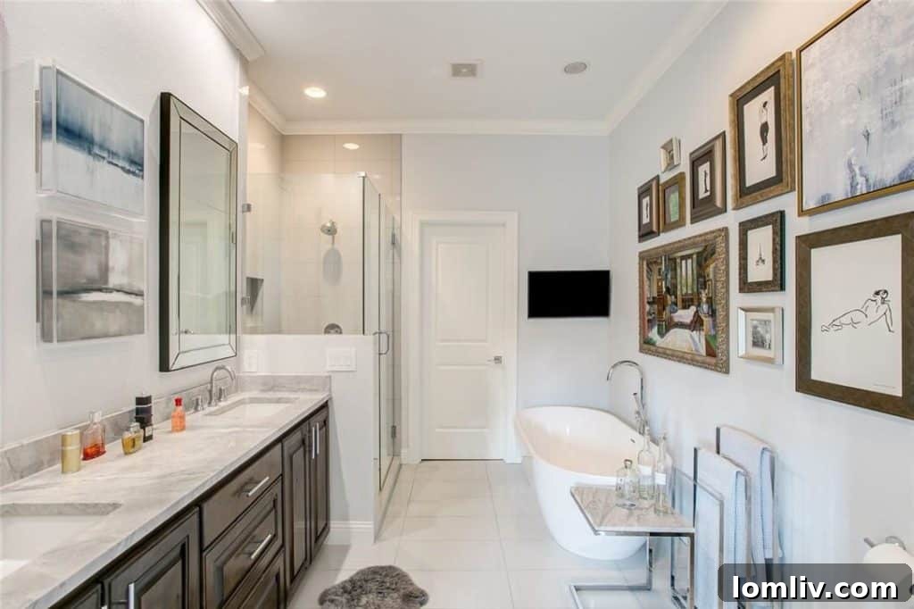 Recently updated master bathroom at 2712 Calder Court featuring a new shower, fresh paint, and elegant counters.