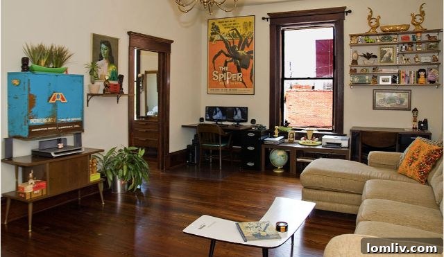 The historic Sawyer Grocery Building apartments at 201 S. Main St., showcasing preserved original hardwood floors and character in Fort Worth.