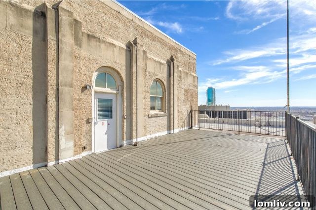 The impressive facade of the Historic Electric Building Apartments at 410 W. 7th St., a landmark of Fort Worth's architectural heritage transformed into vibrant living spaces.