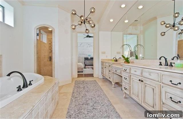 Spacious Living Area with Hardwood Floors and Natural Light