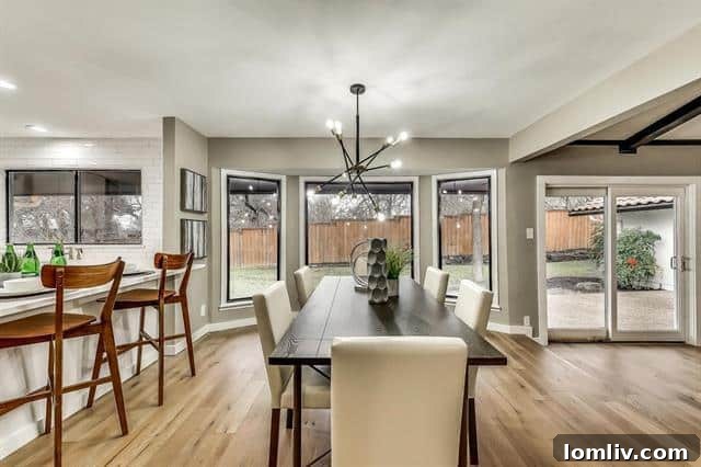 Modern kitchen with quartz countertops and stainless steel appliances at 3914 Amy Avenue, Garland.