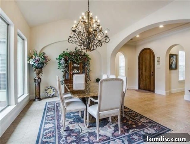 Interior view of a luxurious living room with golf course views at 3041 Creekwood Lane.
