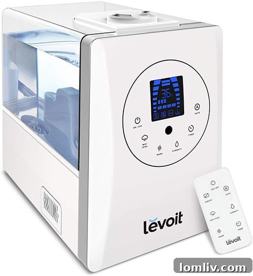 Modern ultrasonic humidifier releasing mist into a room, improving air quality