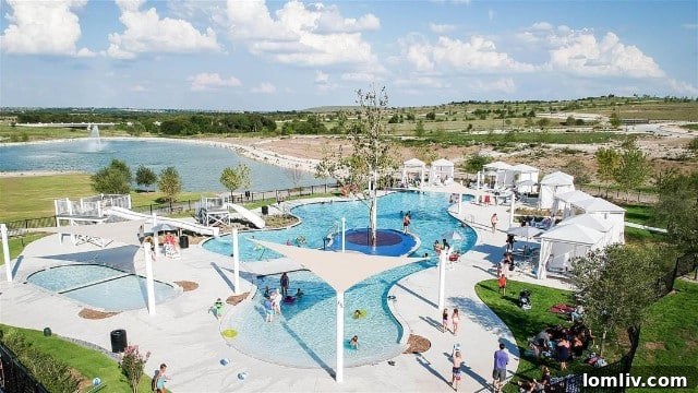 Walsh Makerspace interior with laser cutter, 3D printer, and woodworking equipment